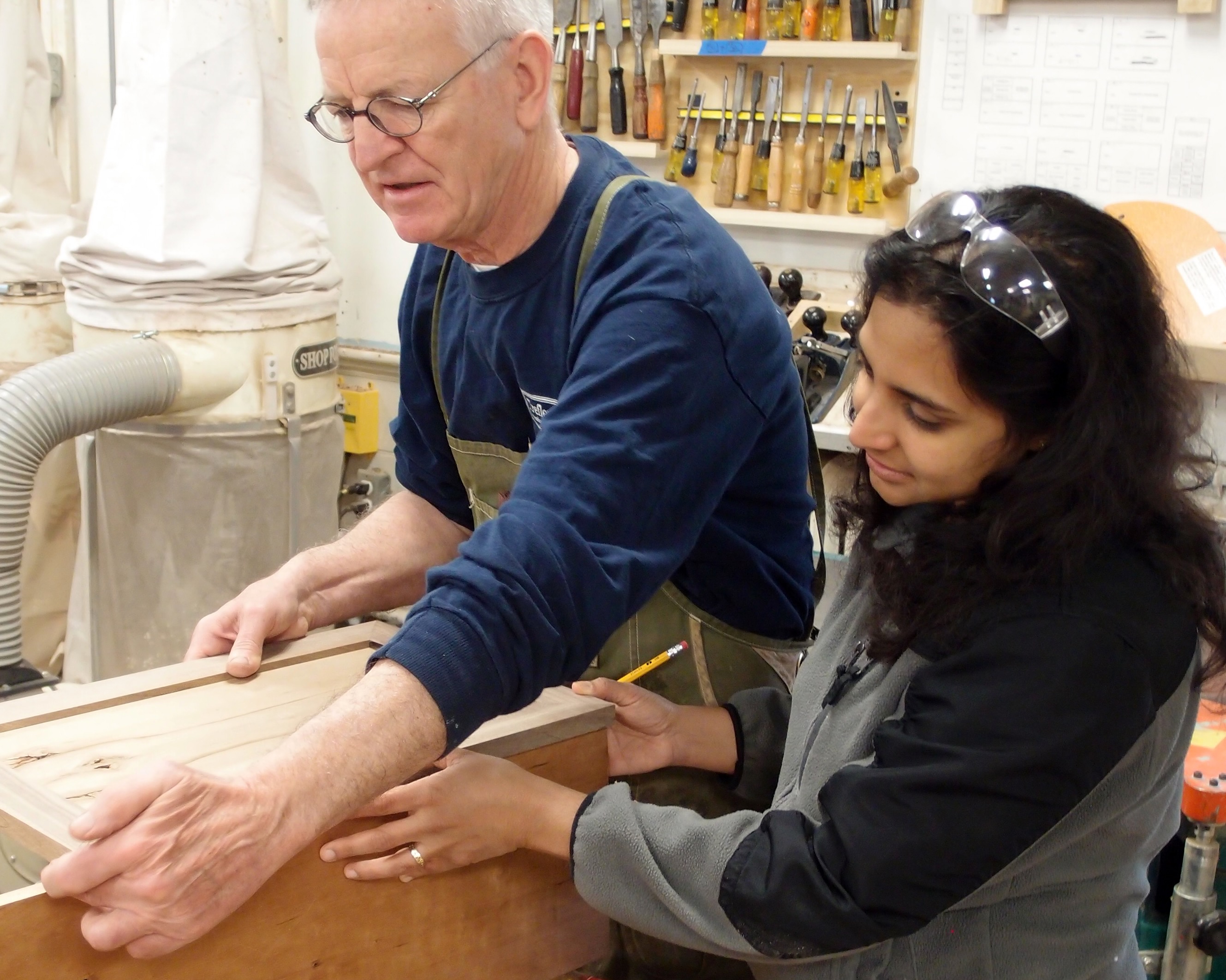 Woodworking instructor with student at the Eliot School