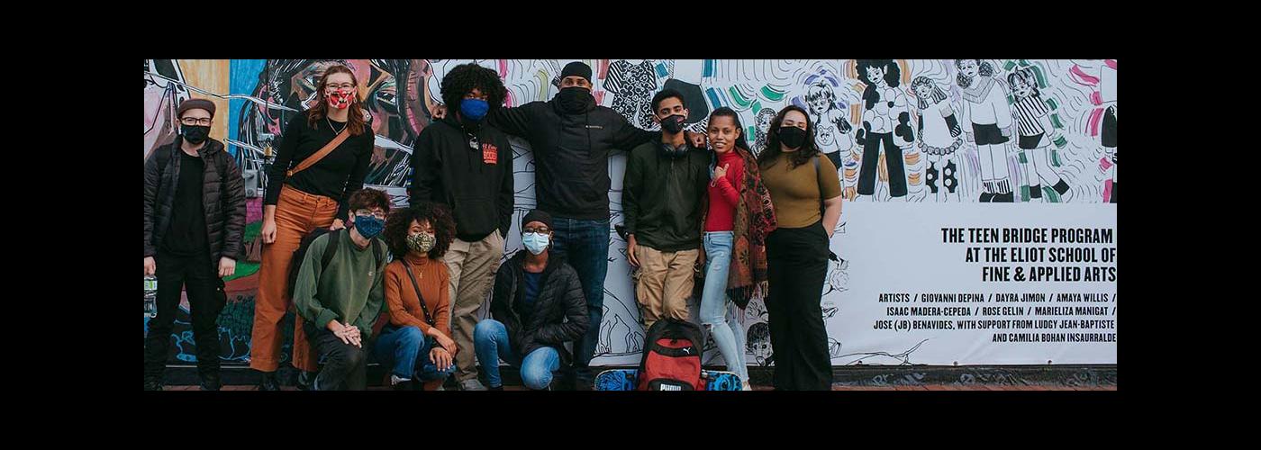 Artist Rob Stull and youth at the Teen Bridge mural at the Fenway Art Walk Artist Rob Stull and Students pose in front of the Teen Bridge mural at the Fenway Art Walk